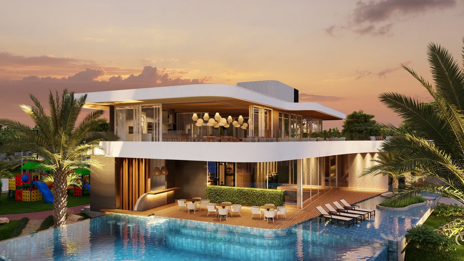 O clube ao entardecer, com a piscina de borda infinita em primeiro plano