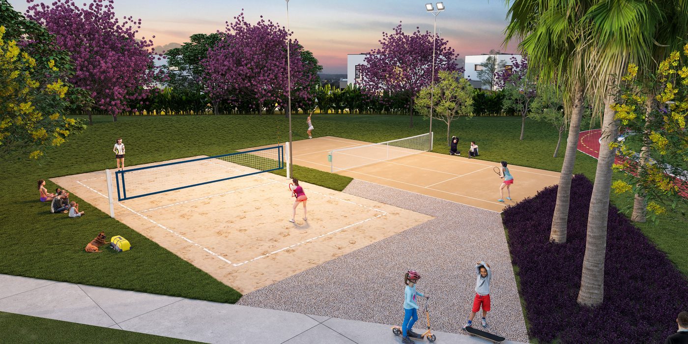Praça esportiva com quadra de areia e quadra de saibro