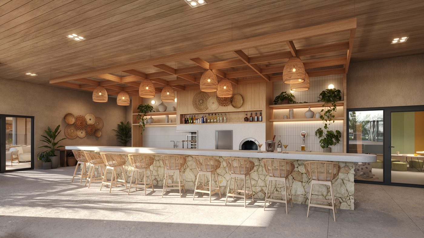 Bar do rooftop, com balcão e banquetas