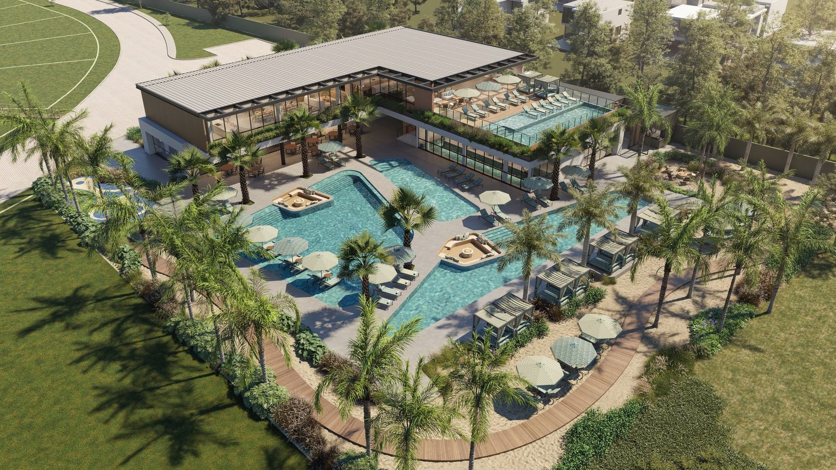 Beach club do Cyano visto de cima, com as piscinas, os gazebos e o mar