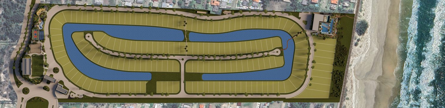 Implantação vista de cima: os lagos, as quadras e os lotes entre a mata e o mar