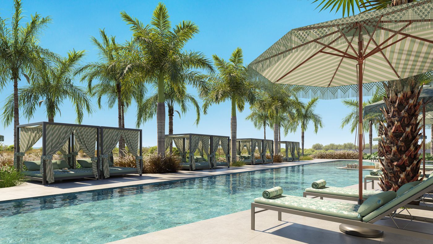 Piscina com gazebos e guarda-sóis