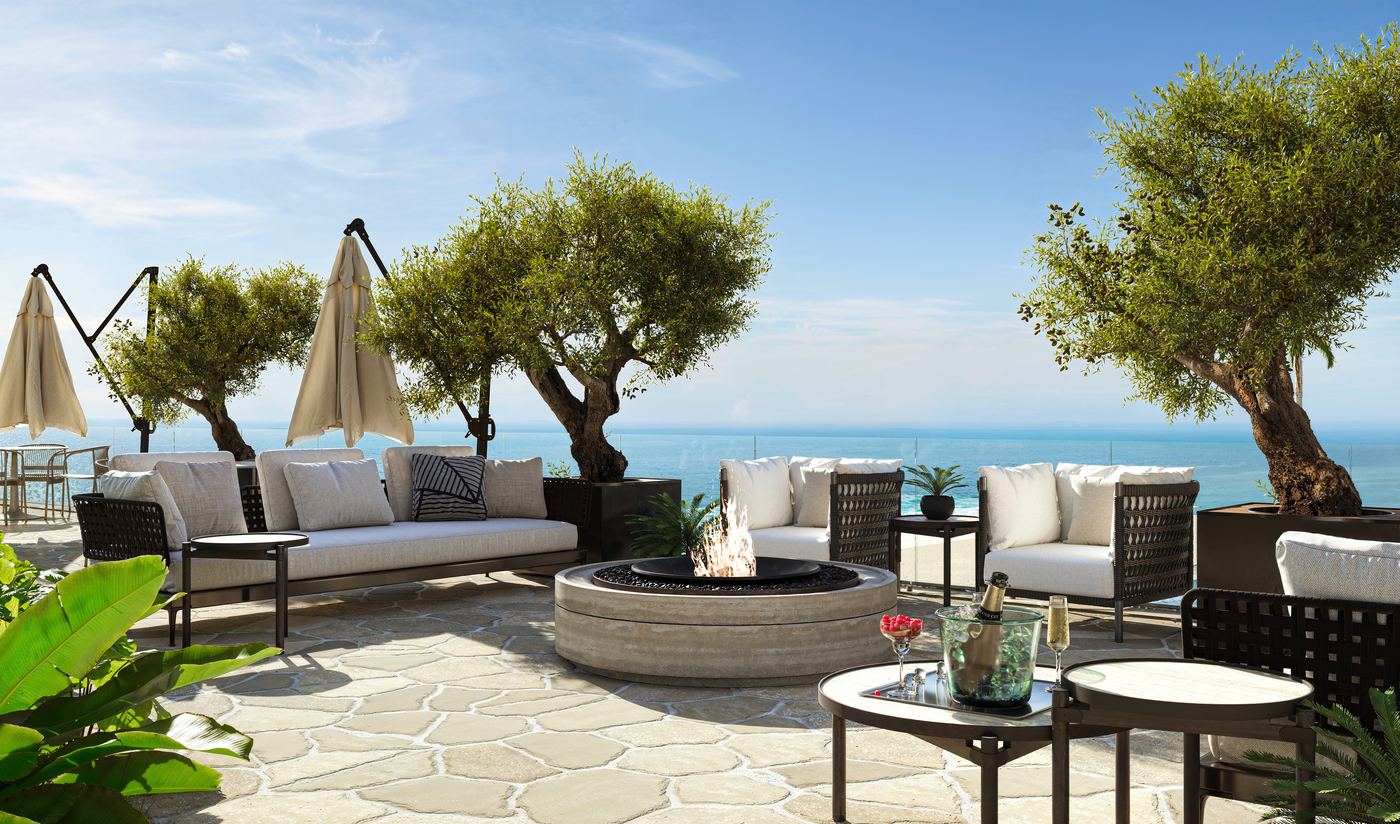 Fireplace externo com lounges ao entardecer