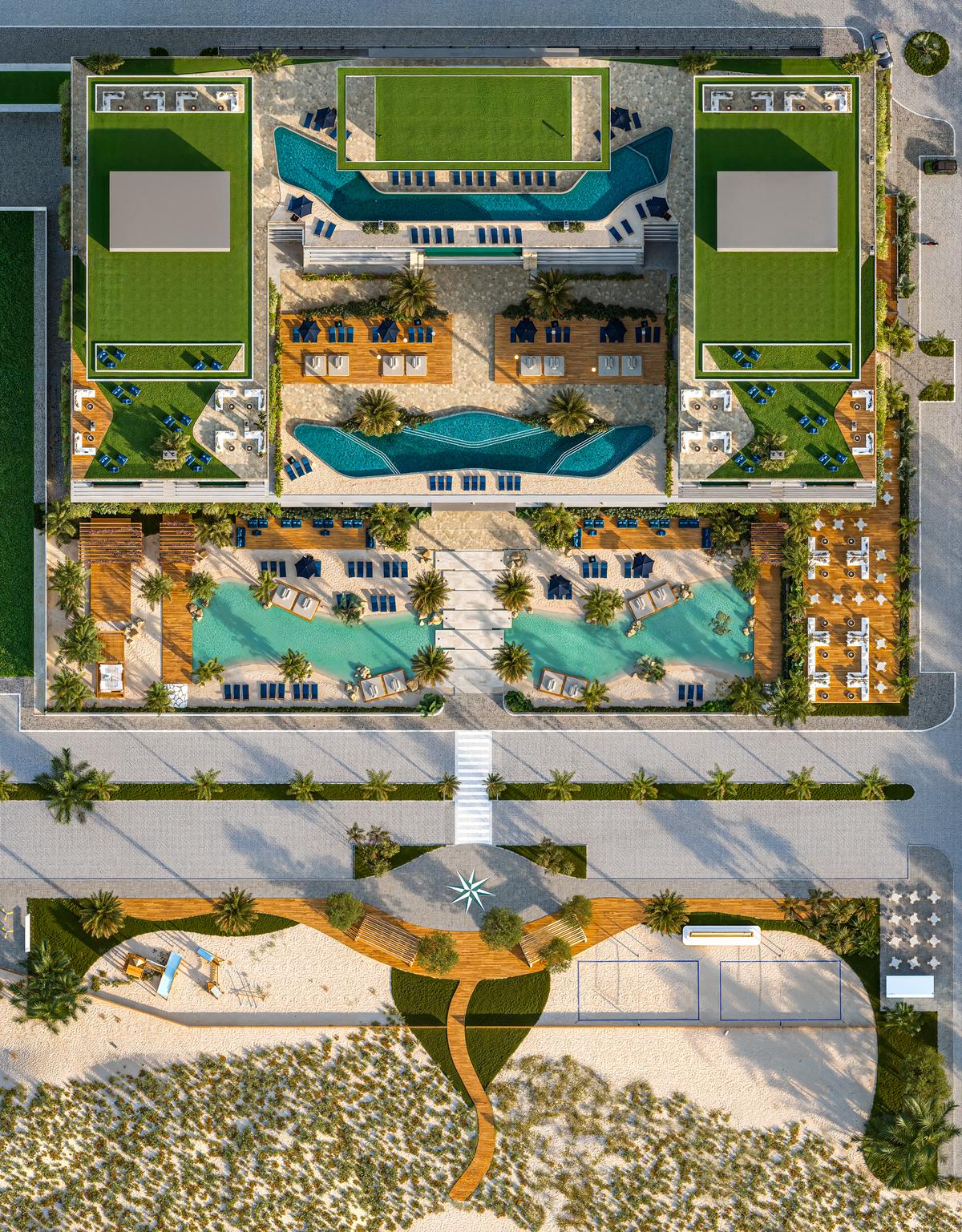 Vista de cima da implantação, com as piscinas, a praia artificial e a praça frontal