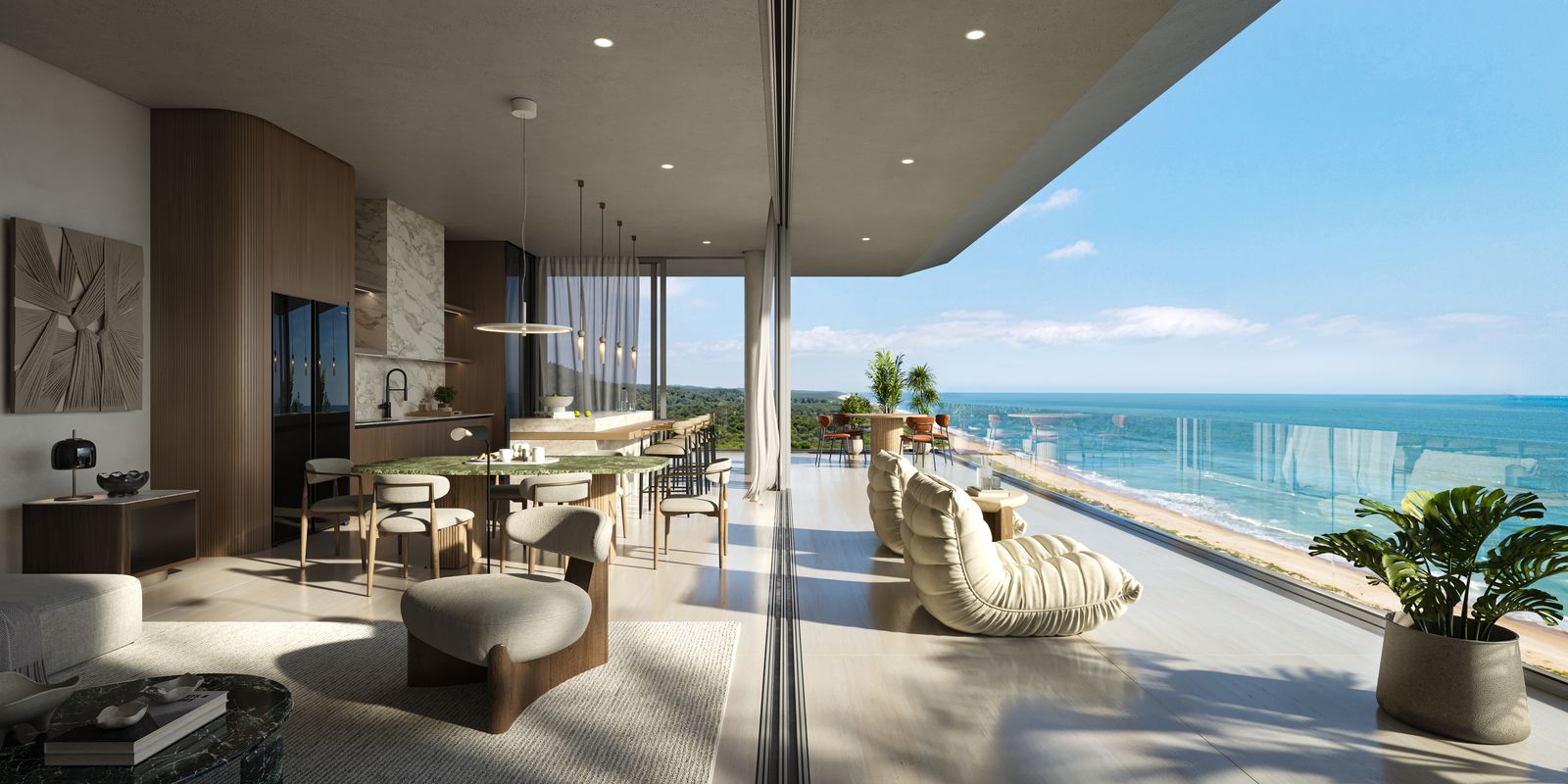 Living integrado de uma unidade, com esquadria piso-teto e o mar ao fundo