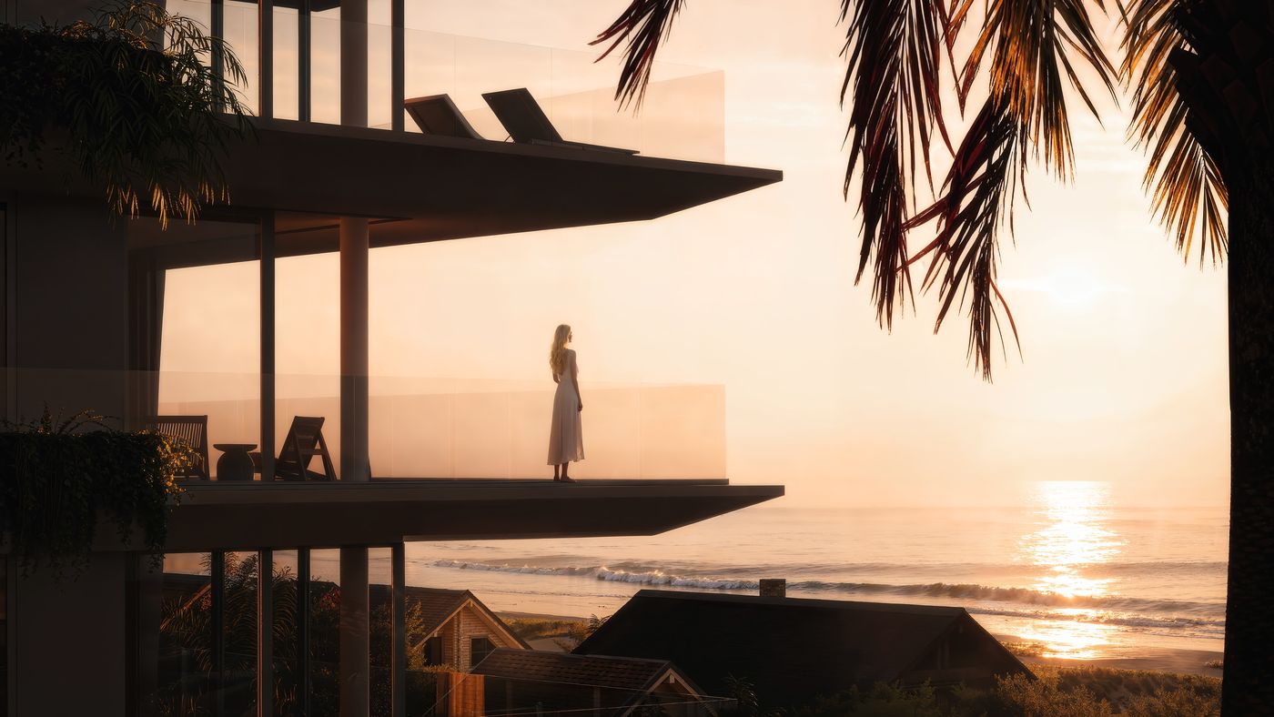 Sacada de uma unidade ao pôr do sol, com o mar ao fundo