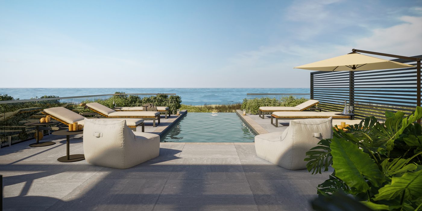 Rooftop do beach club, com piscina de borda infinita voltada para o mar